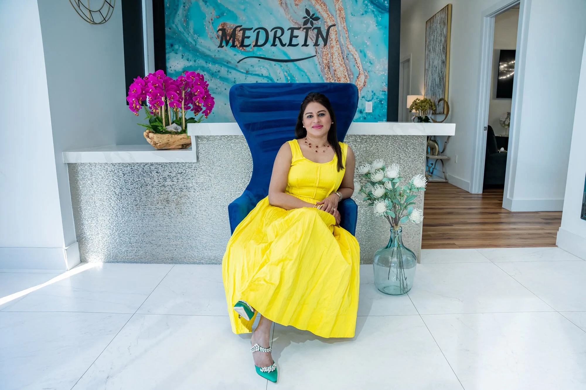 Dr. Haritha Mikkilineni, MD, in the reception lounge at Medrein Health & Aesthetics in Southlake, TX