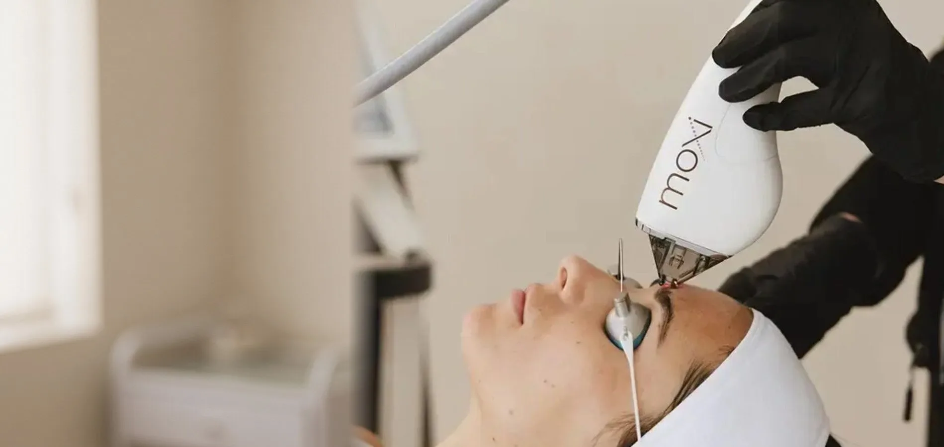 Patient receiving a Sciton Moxi fractional laser resurfacing treatment to the face at Medrein Health in Southlake, TX